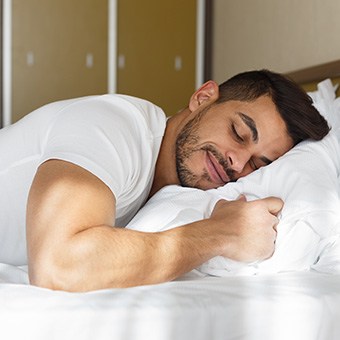 Closeup of man peacefully smiling